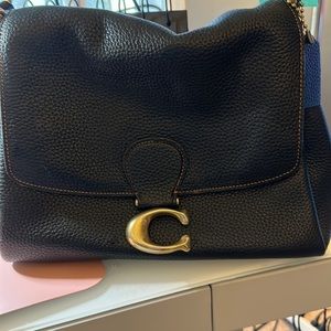Rich leather Coach bag with gold hardware